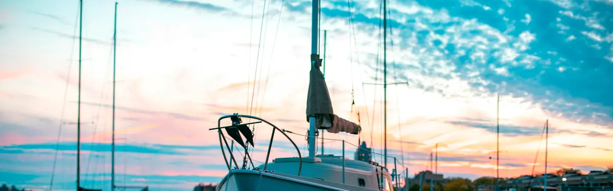 white sailing boat dock in paier